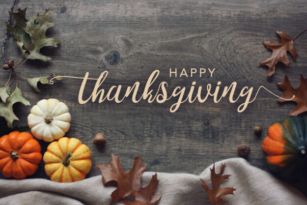 Happy,Thanksgiving,Script,With,Pumpkins,And,Leaves,Over,Dark,Wooden Happy Thanksgiving from Cox Group!