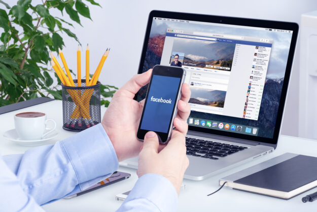 Facebook,App,On,The,Apple,Iphone,Display,And,Desktop,Version Top 8 Facebook Marketing Tips for Small Businesses