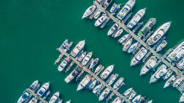 Yacht,Parking,,A,Marina,Lot,,Yacht,And,Sailboat,Is,Moored 2022 Discover Boating Miami International Boat Show Recap
